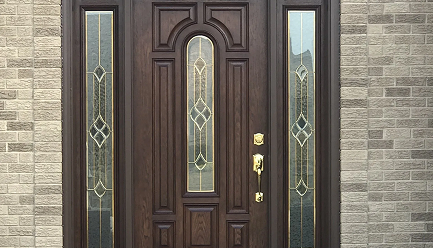 New wood entry door with decorative glass sidelights