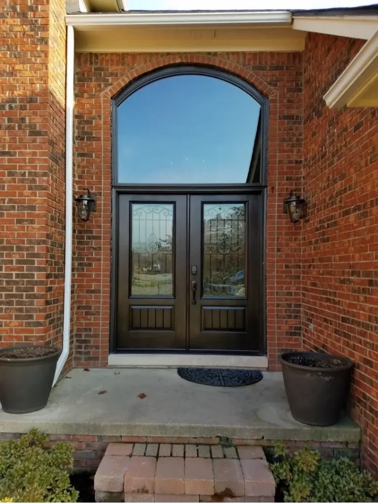 New double entry door with decorative glass and transom
