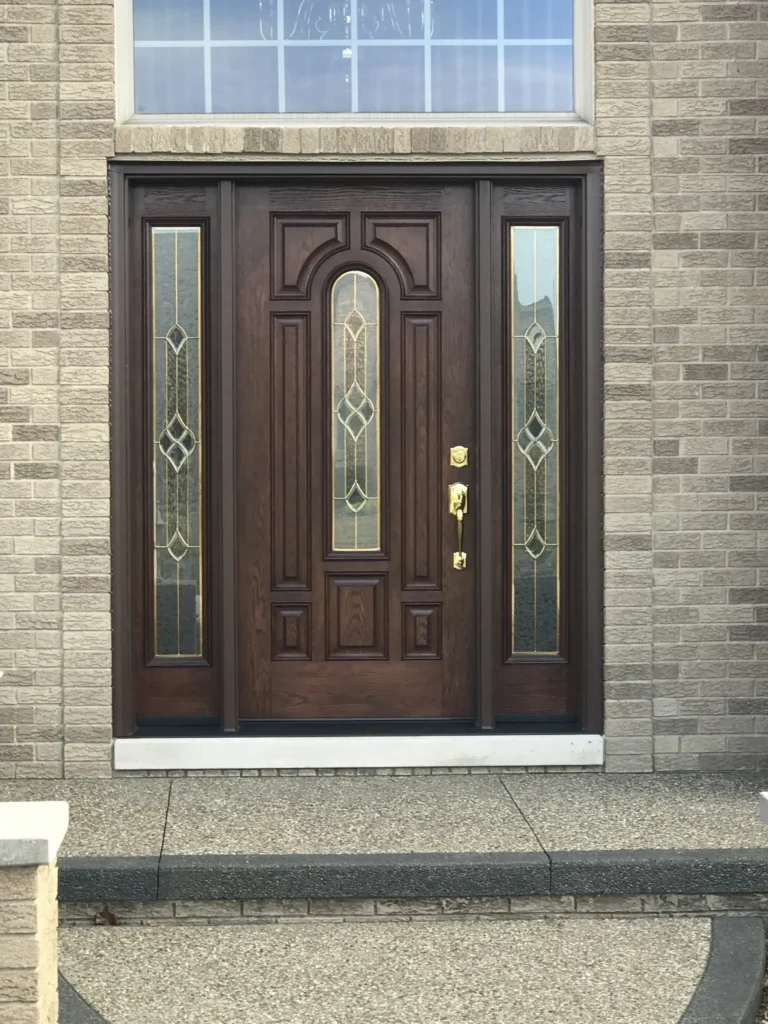 New wood entry door with decorative glass and sidelights