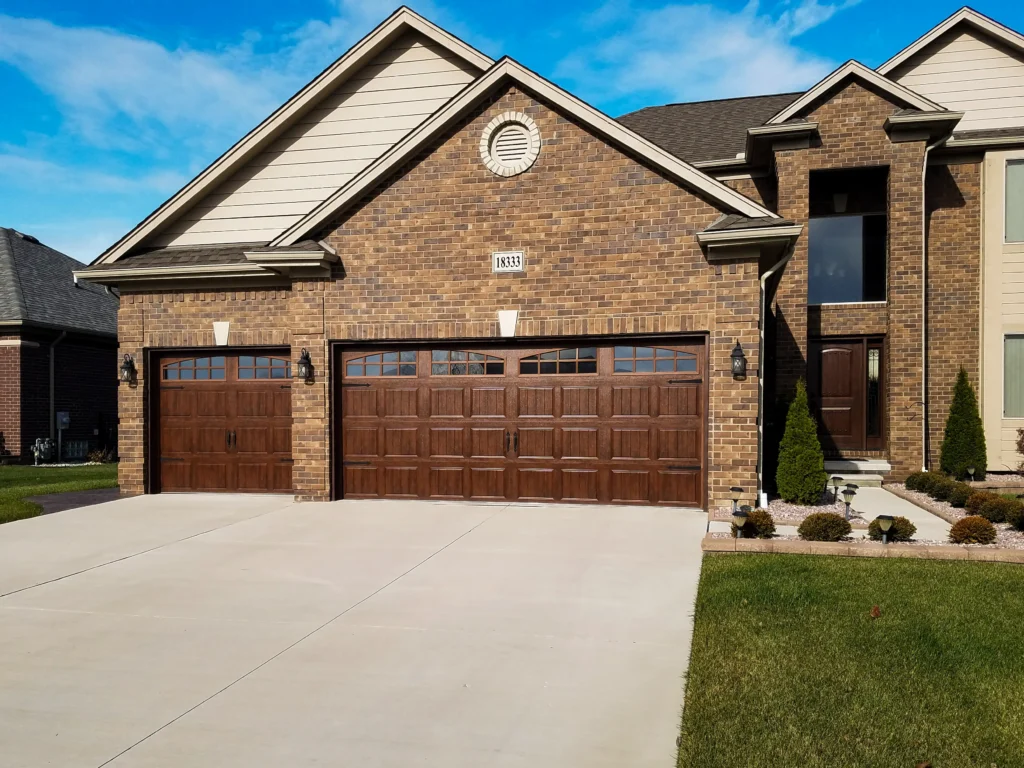 New wood garage doors and entry door
