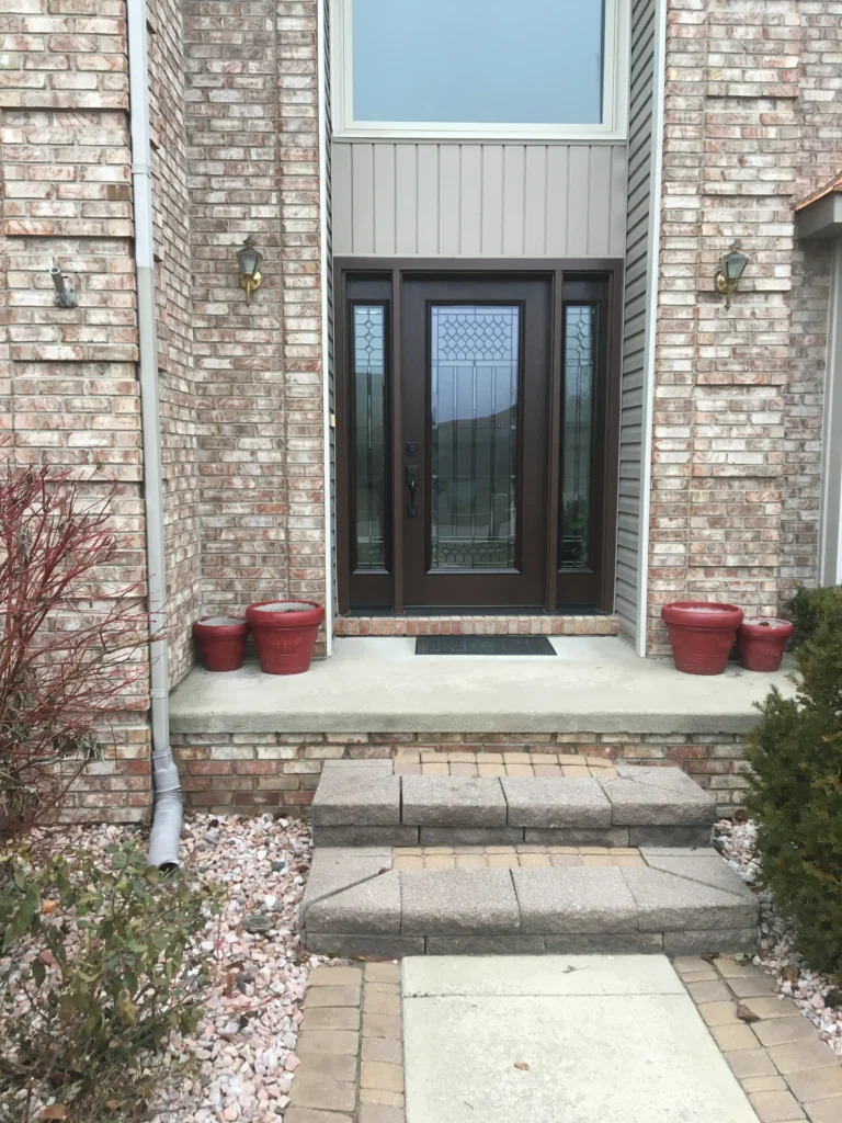 New wood entry door with decorative glass and sidelights