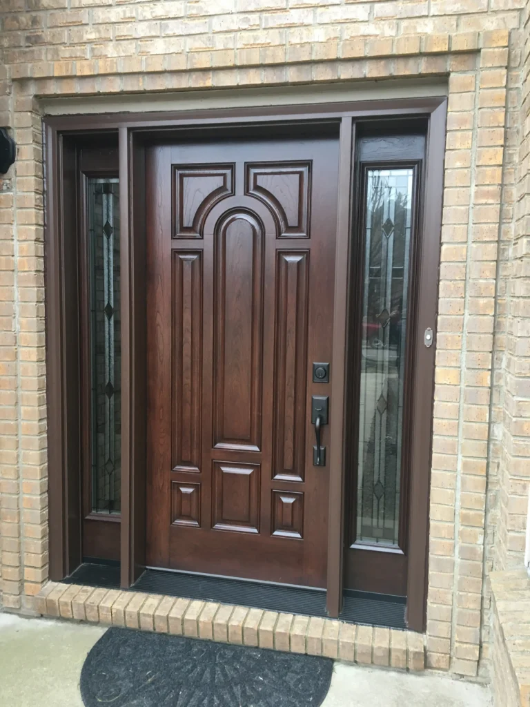 New wood entry door with decorative glass sidelights