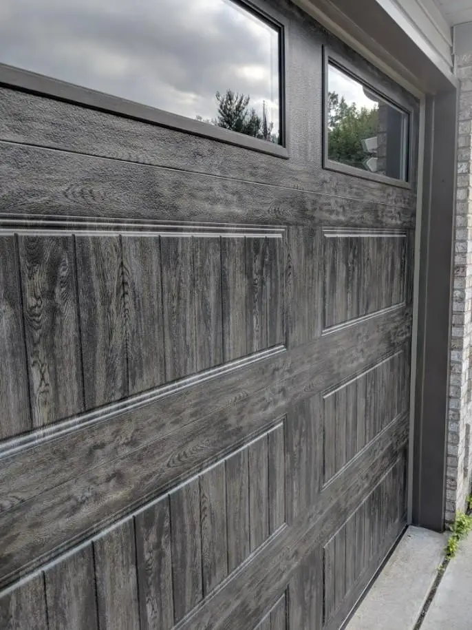 New gray wood garage door
