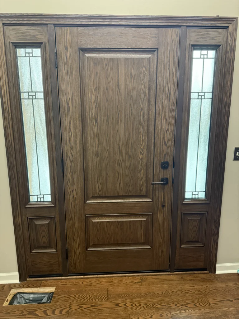 New wood entry door with decorative glass sidelights