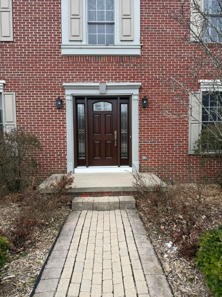New wood entry door with decorative glass and sidelights
