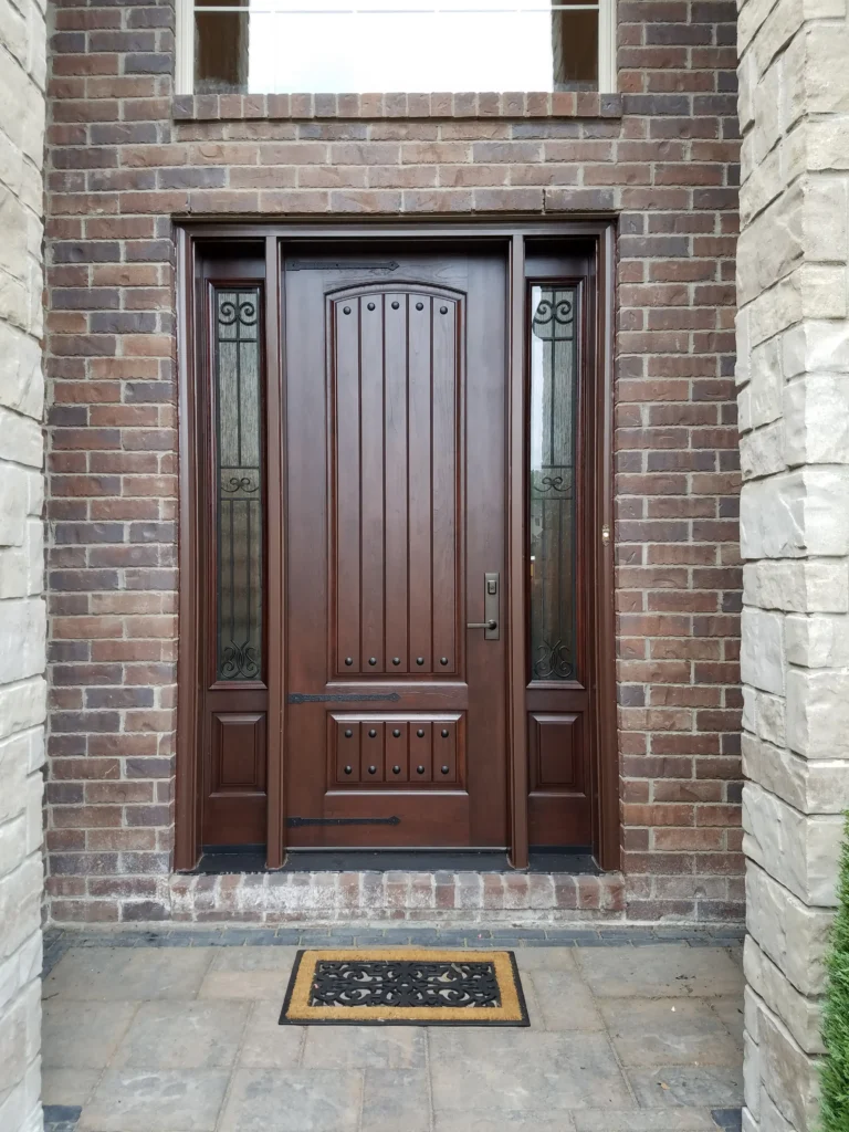 New wood entry door with decorative glass sidelights