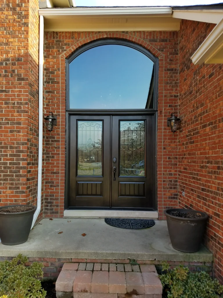 New wood entry door with decorative glass and transom