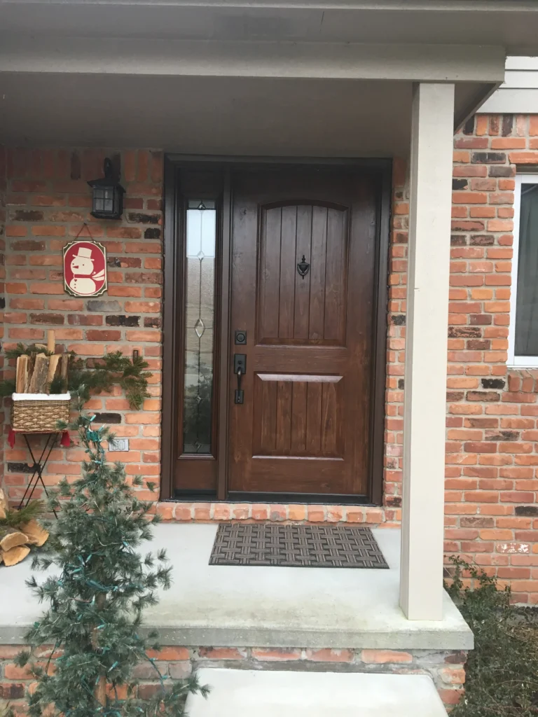 New wood entry door with decorative glass sidelight